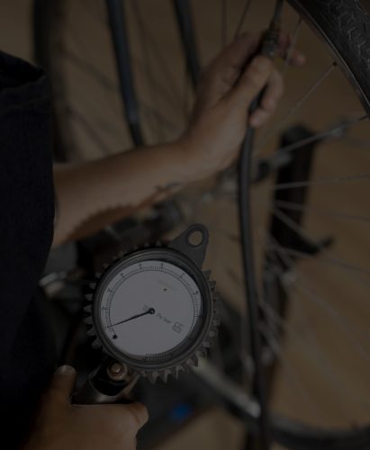 close-up-worker-checking-wheel