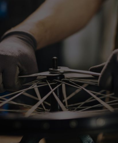 mechanic-repairing-bicycle
